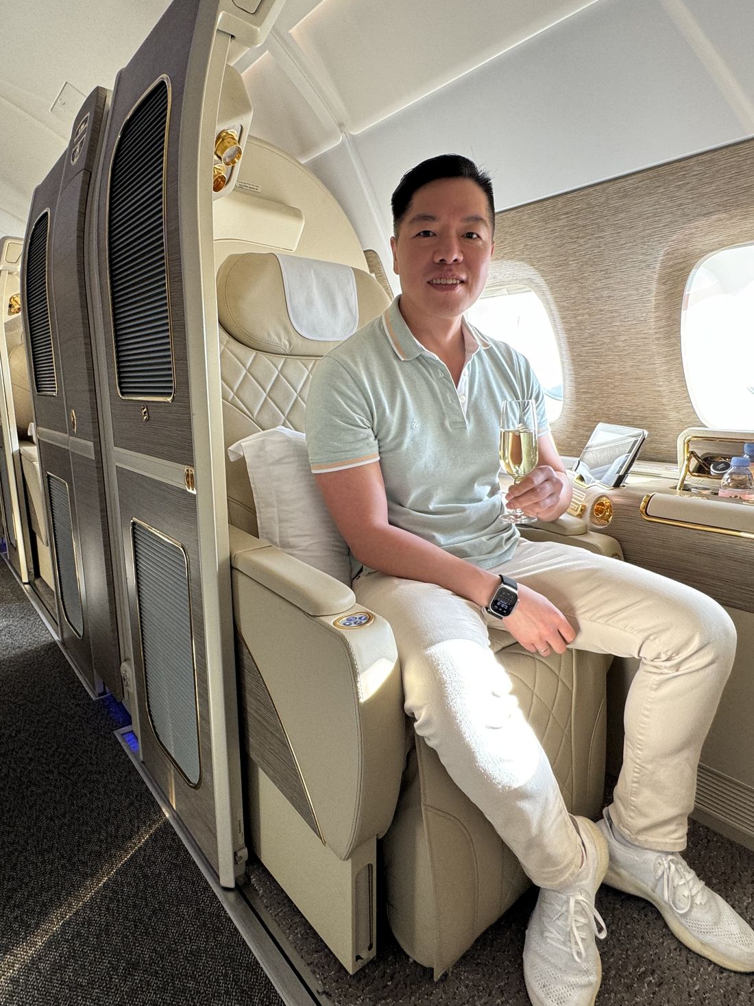 Benny in first class with champagne en route to the Maldives